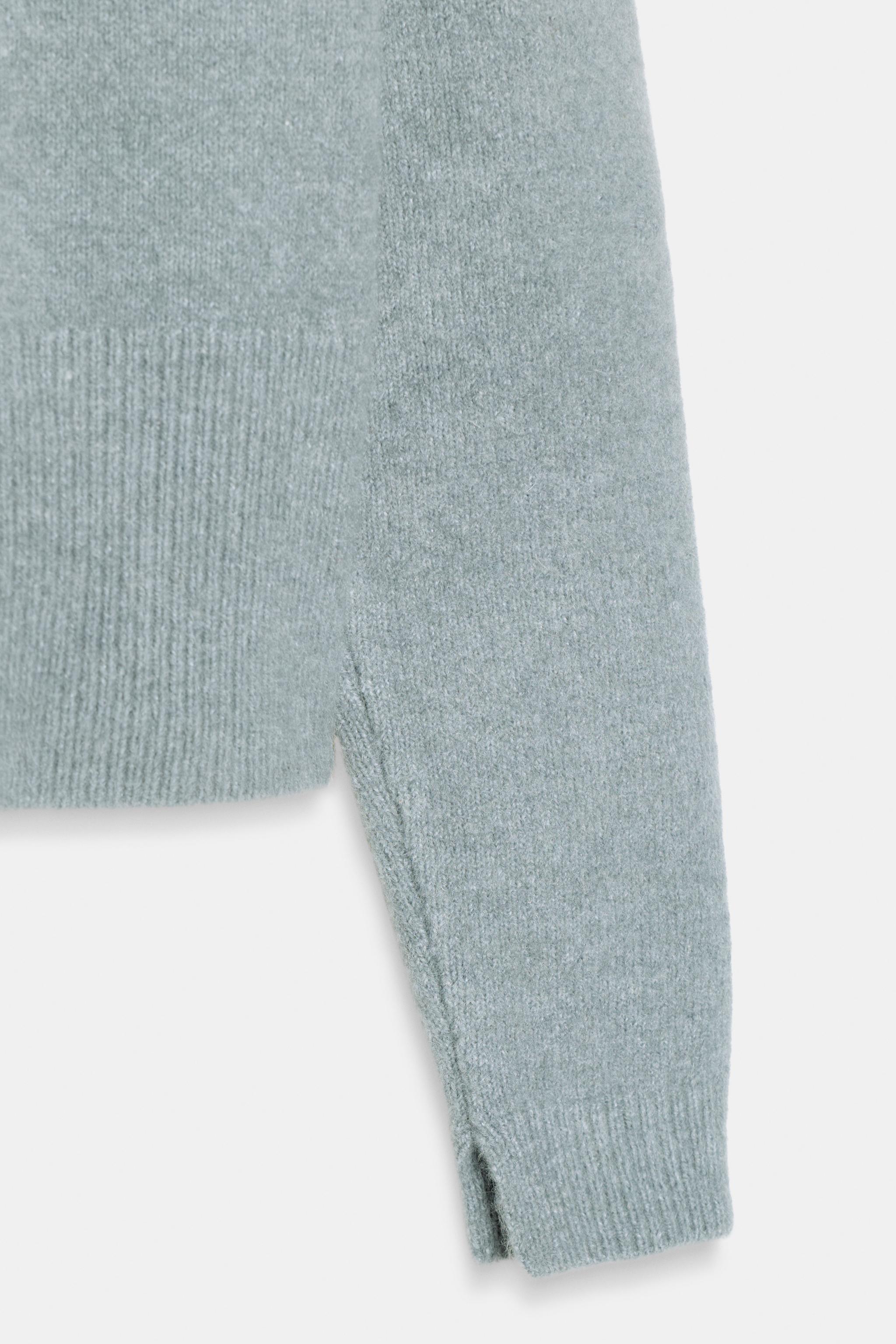 GILET EN MAILLE AVEC BOUTONS BOULES